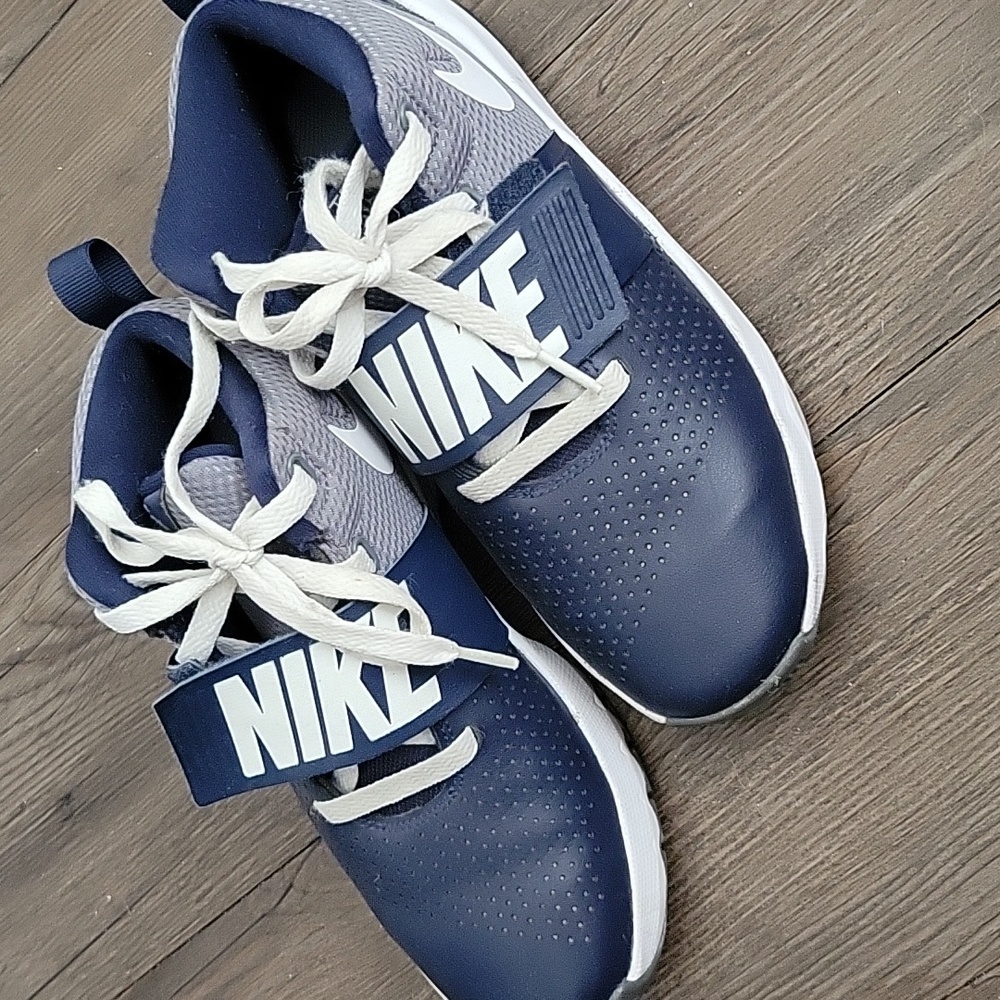 Blue Nike youth shoes